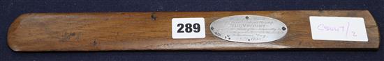 A letter opener purported to be from HMS Victory with silver plaque